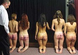 five kneeling girls with their asses caned purple and puffy after a wild party