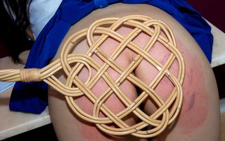 carpet beater spanking