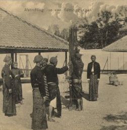 postcard of an indonesian whipping