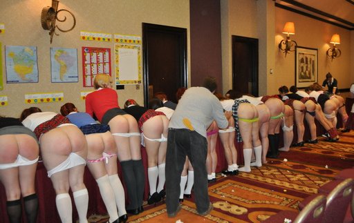 18 naughty girls lined up and bare-bottom spanked all at once