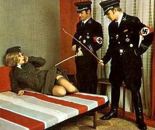 uniformed woman in nazi interrogation cell