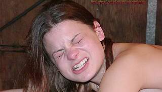 pain toy painful grimace of whipped woman