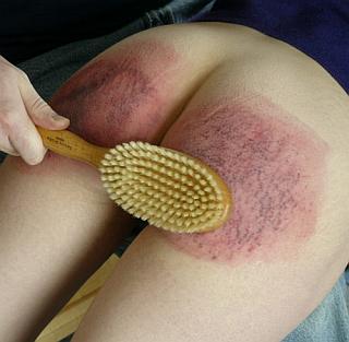 hairbrush spankings on very sore ass