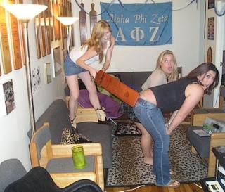 sorority girls getting spanked with a huge wooden paddle