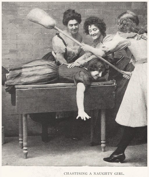 chorus girls spanking one of their number with a broom