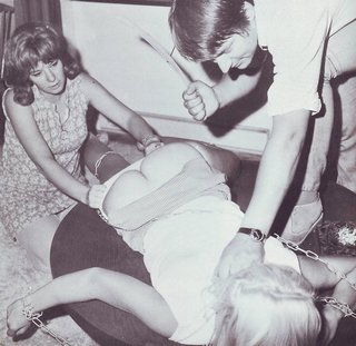 hard bondage spanking with a wooden coat hanger