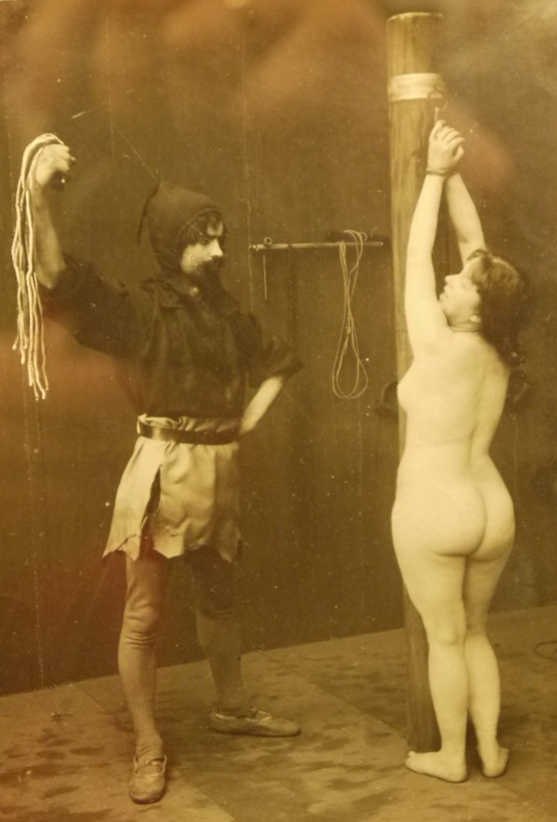 bondage flogging with a rope whip