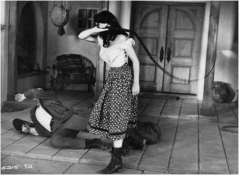 woman hits the man who betrayed her with a bullwhip lashing