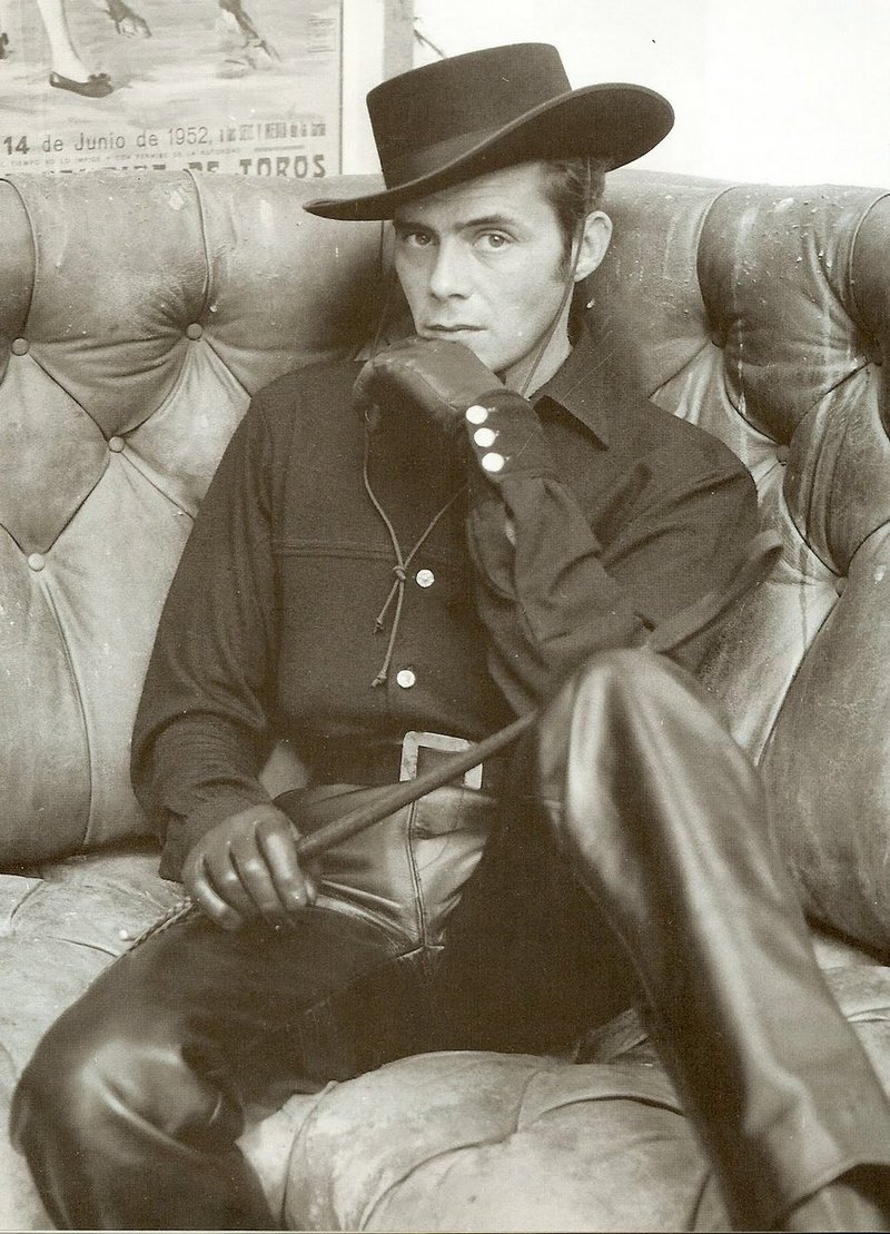 dirk bogarde in full leather cowboy kit is going to fetish the fuck out of somebody