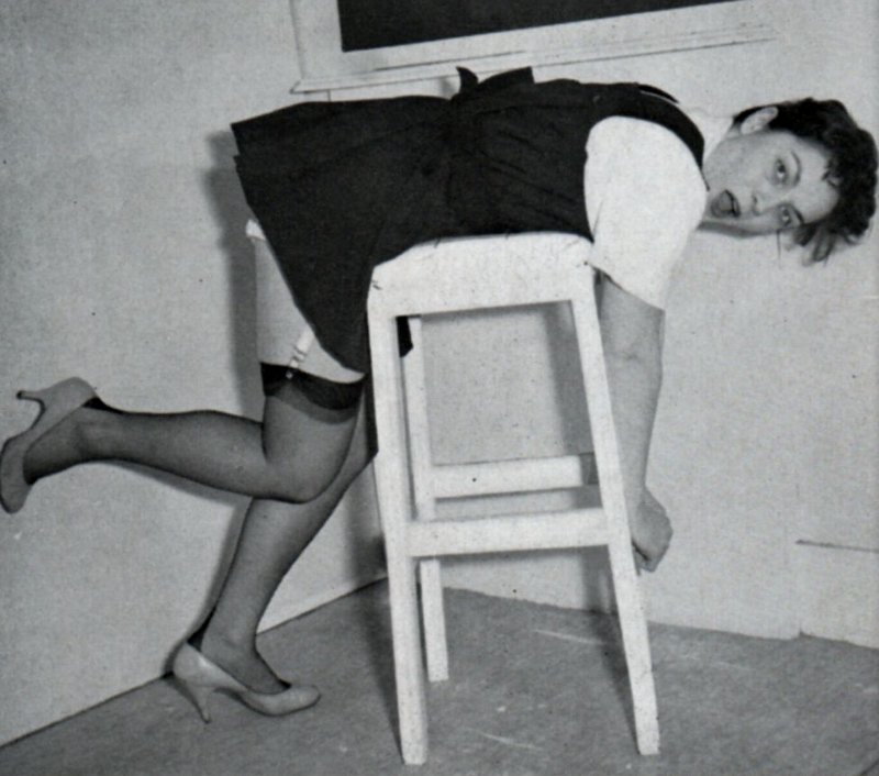 maureen jeggo bent over a caning  bench for academic spanking correction