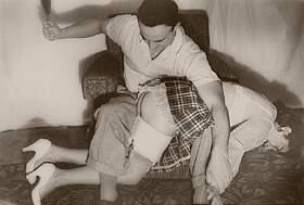 Dad spanking Mom