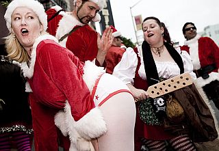 cute santa clause gets a paddle spanking