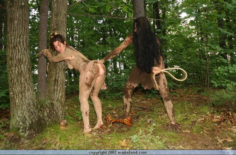 spanking a muddy cave woman