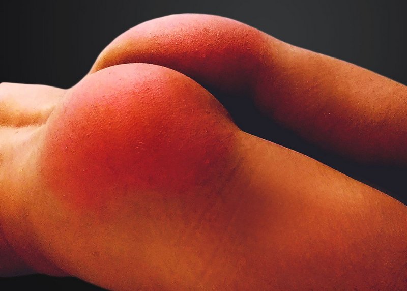 spanked red bottom of a naught tumbler tart
