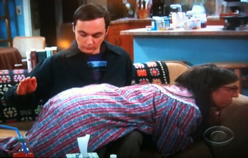 Sheldon spanking Amy for pretending to be sick on The Big Bang Theory