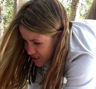 summer camp cutie wincing and crying while being spanked