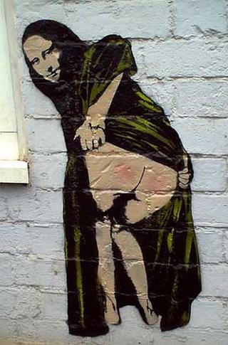 Mona Lisa showing her ass with just a hint of spanked blush -- a bit of street art aka graffiti