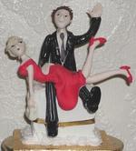 plastic groom spanks plastic bride