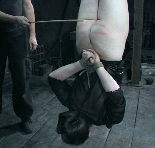 Catherine de Sade being caned while suspended upside down
