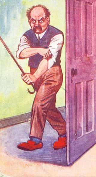 grumpy spanking top about to cane some brat ass