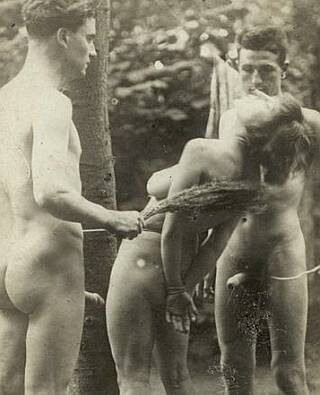 nude woman tied and birched by two eager guys