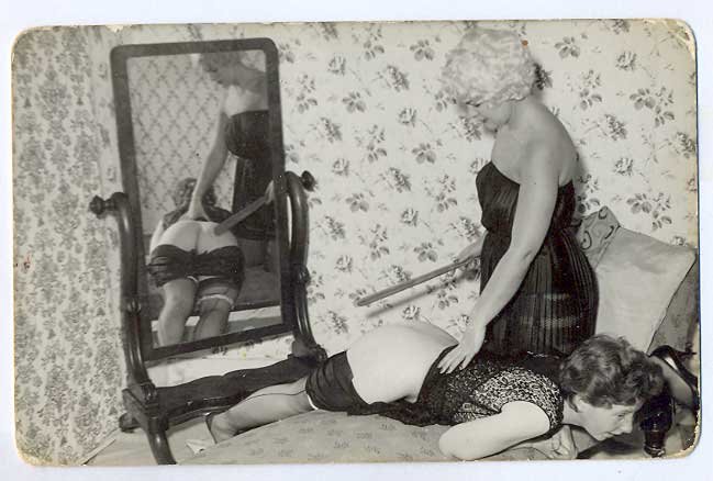 vintage spanking postcard with well-placed mirror