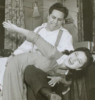 Al Siegel spanking an unknown woman, probably a singer