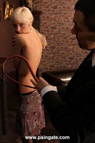 blonde girl defies the whip