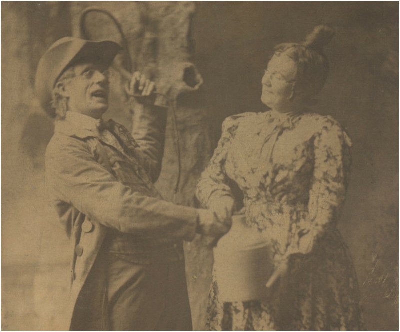 husband and wife struggle over a bottle of whiskey as he brandishes a whip