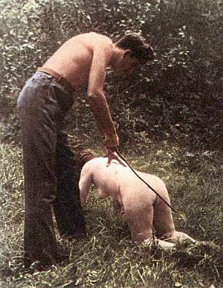 caned woman crawling naked in the woods